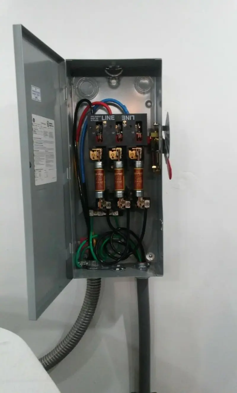 Three-phase disconnect switch installed for Smoke Detector Installation in Pelican Bay